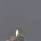 T+10 seconds or so. The Shuttle has just cleared the gantry and is heading upwards at over 100mph.